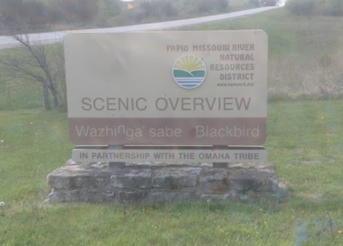 Sign for the Papio Missouri River Natural Resources District, indicating a scenic overview and partnership with the Omaha Tribe.