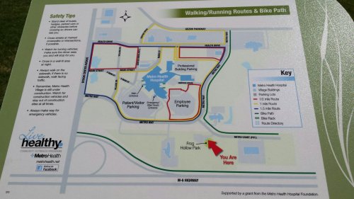 Map showing walking/running routes and bike paths around a hospital area, with marked key locations and safety tips.