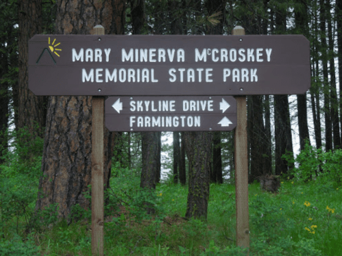 Sign for Mary Minerva McCroskey Memorial State Park, with directional arrows for Skyline Drive and Farmington.