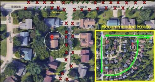 Map showing a neighborhood with a recommended route highlighted in green, fire hydrants marked, and blocked paths indicated.