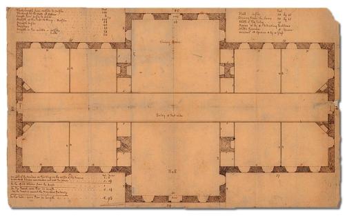 Architectural blueprint featuring a detailed floor plan with labeled rooms and measurements.