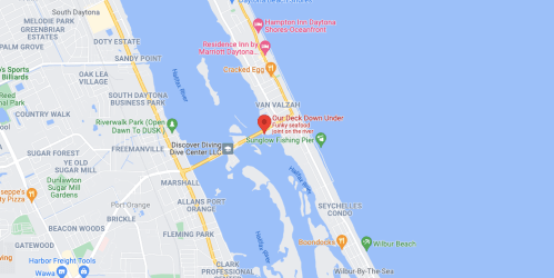 Map showing a coastal area in Daytona Beach, highlighting locations like "Our Deck Down Under" and nearby attractions.