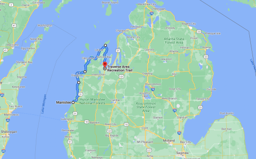 Map showing the Traverse Area Recreation Trail in Michigan, highlighting routes and nearby natural features.