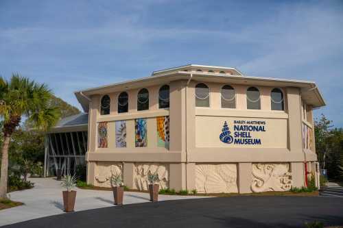 Exterior view of the Bailey-Matthews National Shell Museum, featuring colorful shell displays and modern architecture.