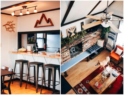 A cozy living space featuring a bar area, a fireplace, and a dog on a colorful rug. Modern decor with mountain accents.
