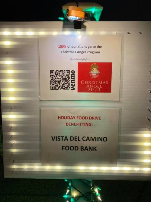 Sign promoting a holiday food drive for Vista del Camino Food Bank, with details about donations and the Christmas Angel Program.