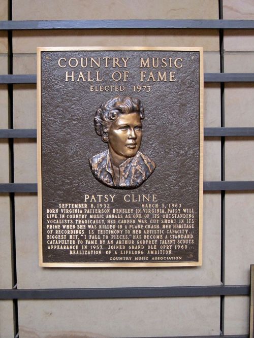 Plaque honoring Patsy Cline, elected to the Country Music Hall of Fame in 1973, detailing her achievements and legacy.
