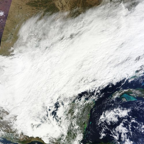 Satellite image showing a large cloud cover over the southern United States and the Gulf of Mexico.