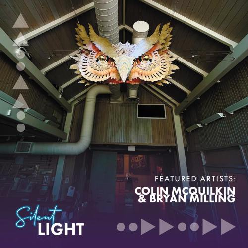 Interior of a venue featuring a large owl sculpture, with text highlighting featured artists Colin McQuilkin and Bryan Milling.