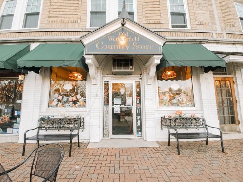 Front view of the Old Westfield Country Store, featuring a welcoming entrance and outdoor seating.
