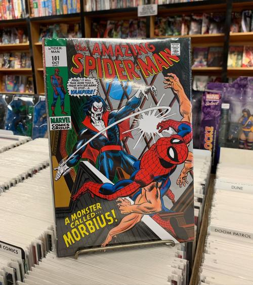 Cover of "The Amazing Spider-Man" #101 featuring Spider-Man battling Morbius in a comic book store.