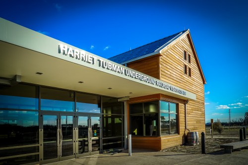 Exterior of the Harriet Tubman Underground Railroad Visitor Center, featuring modern architecture and clear blue skies.