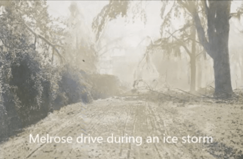 A snowy road lined with trees, showing the aftermath of an ice storm, with the text "Melrose drive during an ice storm."