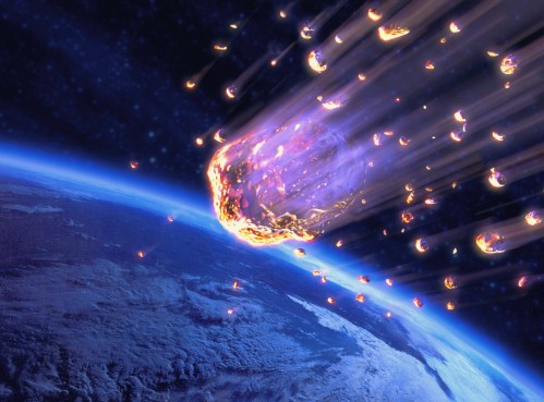 A vibrant meteor shower streaks toward Earth, illuminating the dark space backdrop.