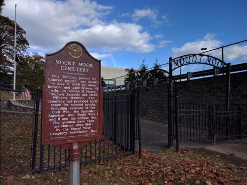 Sign for Mount Moor Cemetery, highlighting its history as a burial ground for people of color and veterans.
