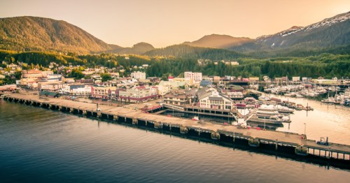 An aerial view of Ketchikan, Alaska's downtown area at sunrise.