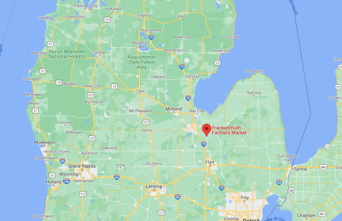 Map showing the location of Frankenmuth Farmers Market in Michigan, surrounded by various towns and natural areas.