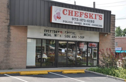 Exterior of ChefSki's, a Polish restaurant, featuring a sign and large windows with a special meal advertisement.