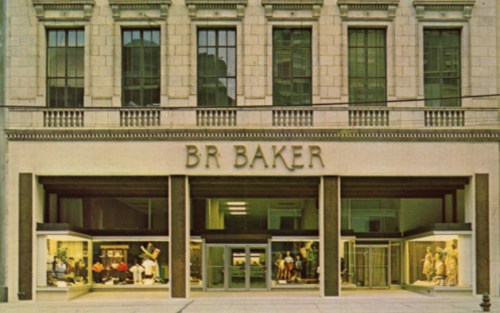 Exterior view of the BR Baker store, featuring large glass windows and a prominent sign above the entrance.