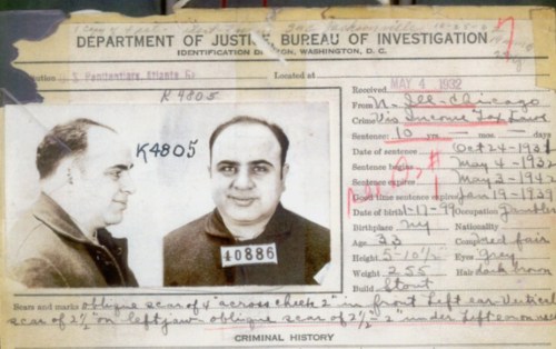 Mugshot and identification card for Al Capone, dated May 4, 1932, with personal details and physical description.