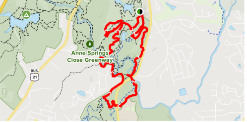 Map showing the trail route of Anne Springs Close Greenway, marked in red with surrounding areas and roads.