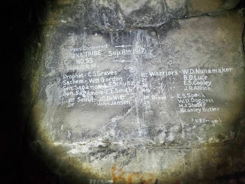 Inscription on a stone wall listing names and titles related to the IEXA Tribe, dated September 8, 1917.