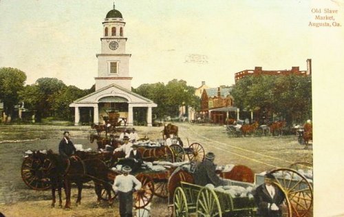 Historic image of the Old Slave Market in Augusta, GA, featuring horse-drawn carriages and a clock tower.