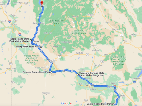 Map showing a route through Idaho, highlighting parks like Eagle Island, Lucky Peak, and Bruneau Dunes State Park.