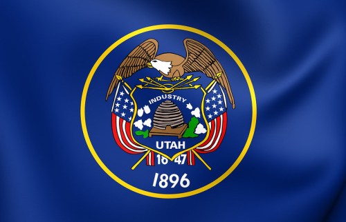 Utah state flag featuring a beehive, eagle, and crossed flags, with "Industry" and the year 1896.
