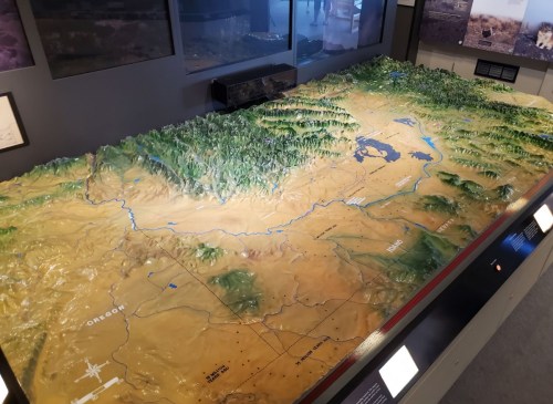 A detailed topographic map showcasing mountainous terrain and rivers, with labels for Oregon and surrounding areas.