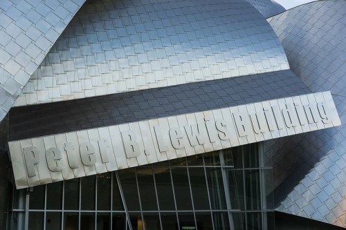 Close-up of the Peter B. Lewis Building's unique architectural design and prominent signage.