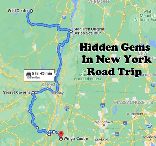 Map showing a road trip route in New York, highlighting stops at Wild Center, Secret Caverns, and Wing's Castle.