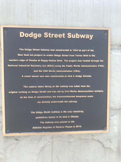 Plaque detailing the history of the Dodge Street Subway, constructed in 1934, located in Omaha, Nebraska.