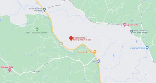 Map showing the location of Paradise Hills Winery Resort & Spa, surrounded by green hills and nearby landmarks.