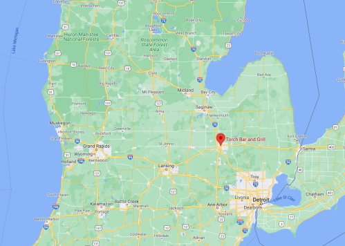Map showing Michigan with a marker for Torch Bar and Grill, located south of Saginaw and near Lansing.