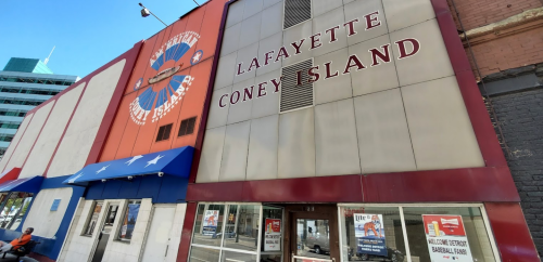 Exterior of Lafayette Coney Island restaurant, featuring a red and white facade with large signage.