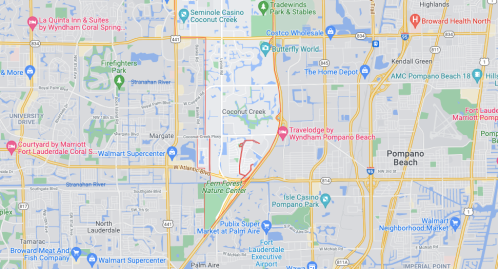 Map showing the area around Coconut Creek, Florida, including parks, hotels, and major roads.