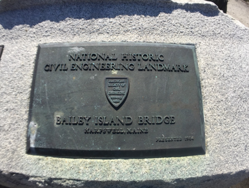 Plaque marking the Bailey Island Bridge as a National Historic Civil Engineering Landmark in Harpswell, Maine.