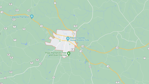 Map showing the layout of a region with roads, landmarks, and the Robert Toombs House Historic Site highlighted.