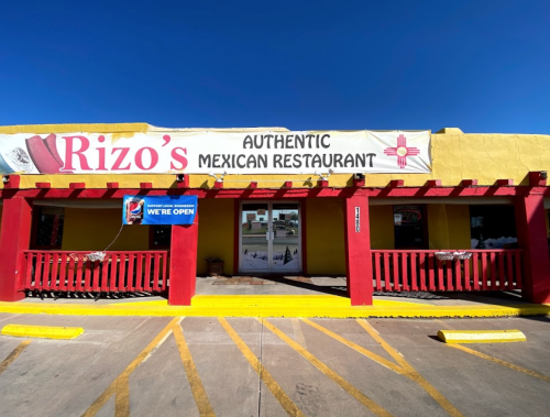 Exterior of Rizo's Authentic Mexican Restaurant, featuring a colorful facade and a sign indicating it's open.