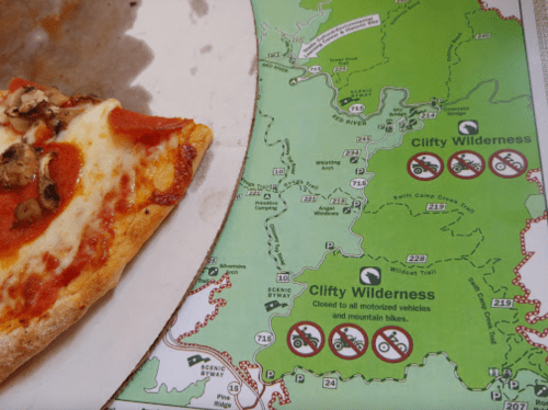 A map of Clifty Wilderness with pizza on the side, showing trails and restrictions for motorized vehicles.