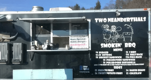 Food truck menu for "Two Neanderthals Smokin' BBQ" featuring various BBQ items and sides.