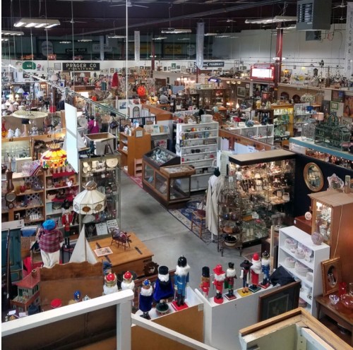 Aerial view of a bustling antique store filled with various collectibles, furniture, and decorative items.