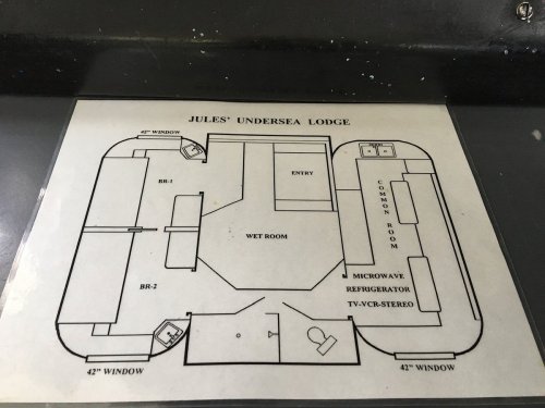 Blueprint of Jules' Undersea Lodge, showing layout with rooms, entry, wet room, and common area.