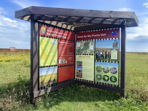 Information kiosk at Northern Tallgrass Prairie National Wildlife Refuge, featuring maps and educational displays.