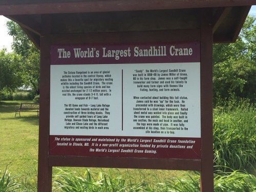 Sign about the World's Largest Sandhill Crane, detailing its history and significance in Steele, ND.