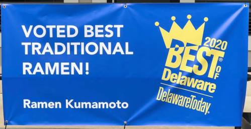 Blue banner announcing "Voted Best Traditional Ramen! 2020 Best of Delaware" for Ramen Kumamoto.