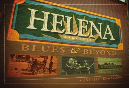Mural featuring "Helena, Arkansas" with "Blues & Beyond" and images of local culture and history.