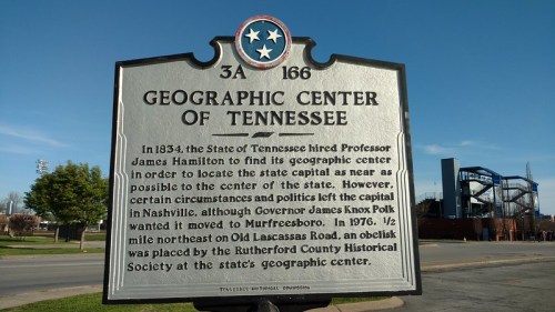 Historical marker detailing the geographic center of Tennessee, established in 1834, with information about its location changes.