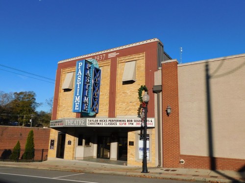 Historic Pastime Theatre building with marquee advertising a performance by Taylor Hicks and Christmas classics.